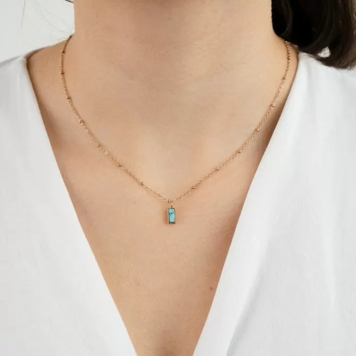 Goudkleurige ketting met blauw natuursteen | Studio XOVA V.25